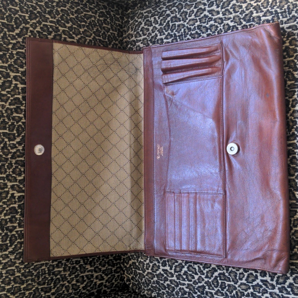 Leather laptop and document case with magnetic closure.